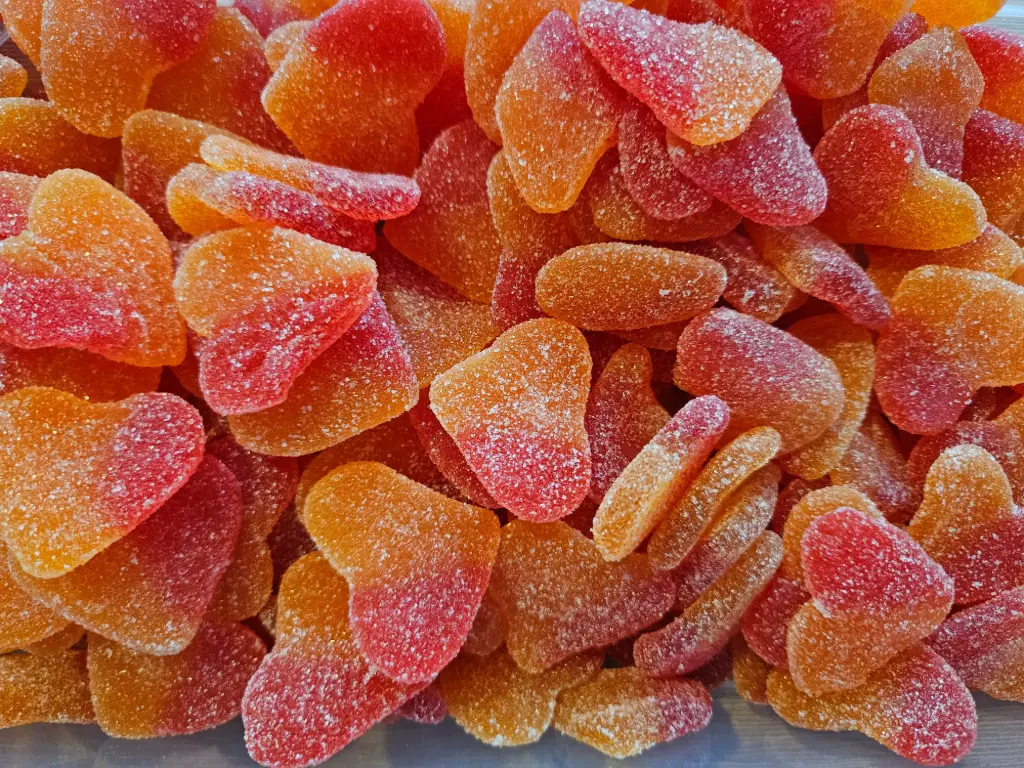 Cœurs pêche sucré (vendu par 100gr)